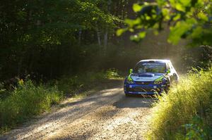 Travis Pastrana / Derek Ringer prepare for a hard right on SS3 in their Subaru WRX STi.