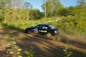 Amy BeberVanzo / Ole Holter set up their Subaru WRX for hard right-hander on SS3.