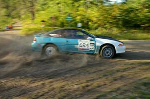 Adam Markut / Chris Gordon drift through a hard right-hander on SS3 in their Eagle Talon.