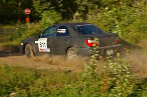 Jaroslaw Sozanski / Bartosz Sawicki set up for a hard right on SS3 in their Subaru WRX.