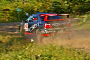 Arkadiusz Gruszka / Grzegorz Dorman prepare for a hard right on SS3 in their Subaru WRX STi.