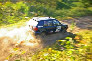 Paul Koll / Matt Wappler rocket down a straight on SS3 in their VW Golf.