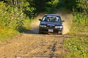 Ben Hanka / Greg Hanka rocket down a straight on SS3 in their Nissan Sentra SE-R.