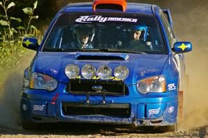 Slawomir Balda / Janusz Topor blast down a straight on SS3 in their Subaru WRX STi.
