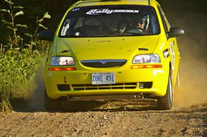 The Suzuki Swift of Jim Stevens / Marianne Stevens at speed on SS3.