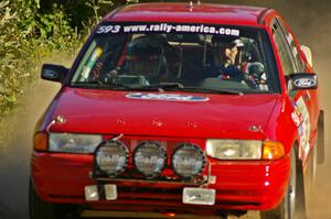 Gerardo Pin / John Butler at speed on SS2 in their Ford Escort GT.