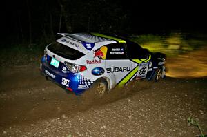 Travis Pastrana / Derek Ringer at hard left on SS5 in their Subaru WRX STi.