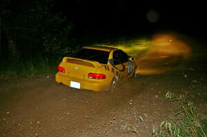 Kyle Sarasin / Mikael Johansson drift their Subaru Impreza through a quick left-hander on SS5.