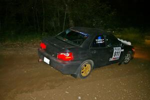 Jaroslaw Sozanski / Bartosz Sawicki fly through a sweeper on SS5 in their Subaru WRX.