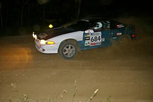 Adam Markut / Chris Gordon blast through a fast left-hander on SS6 in their Eagle Talon.