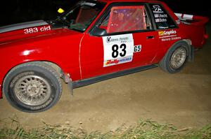 Mark Utecht / Rob Bohn drift their Ford Mustang through a sweeper on SS6.