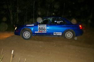 The George Georgakopoulos / Faruq Mays Subaru WRX goes wide through a left-hander on SS6.