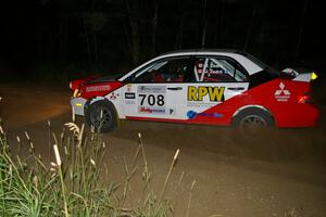 Jan Zedril / Jody Zedril exit out of a left-hander on SS6 in their Mitsubishi Lancer ES.