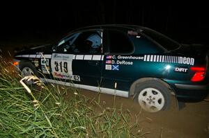 Chris Greenhouse / Don DeRose exit out of a left-hander on SS6 in their Plymouth Neon.