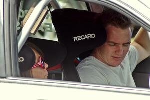 Piotr Wiktorczyk / Chrissie Beavis prepare to leave parc expose in their Subaru WRX STi.