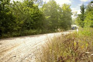 Travis Pastrana / Derek Ringer at speed on SS10 in their Subaru WRX STi.