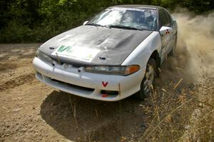 The Eagle Talon of Adam Markut / Chris Gordon drift through a fast left-hander on SS10.