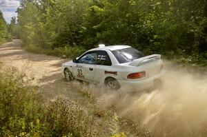 Bob Olson / Conrad Ketelsen blast out of a left-sweeper on SS10 in their Subaru Impreza 2.5 RS.