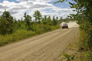 Roman Pakos / Maciej Sawicki exit out of a fast left-hander on SS10 in their Ford Focus SVT.