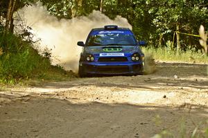Heath Nunnemacher / Kim DeMotte nail a right-hander on SS12 in their Subaru WRX.