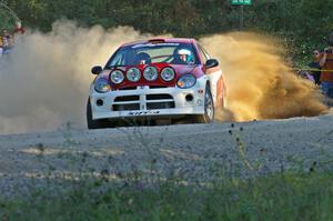 Doug Shepherd / Karen Wagner sling gravel magnificently on SS13 in their Dodge SRT-4.