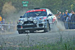 Robert Borowicz / Dave Parps blast away from the spectator location on SS13 in their Subaru WRX.