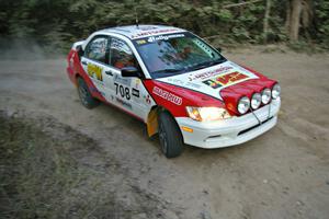 Jan Zedril / Jody Zedril prepare for a right-hander on SS15 in their Mitsubishi Lancer ES.