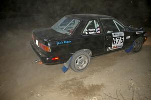 Ben Hanka / Greg Hanka cruise through a 90-right on SS15 in their Nissan Sentra SE-R just prior to the stage being scrubbed.