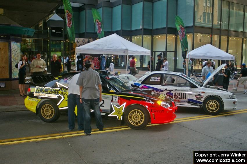 The Andy Pinker / Robbie Durant Subaru WRX STi and the Kenny Bartram / Dennis Hotson Subaru Impreza L Coupe on the Nicollet Mall