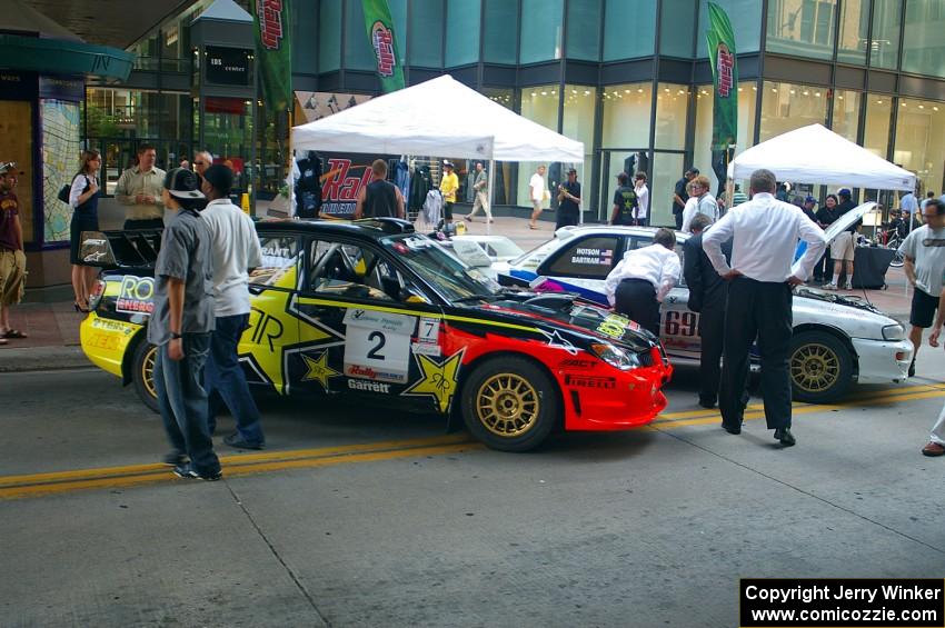 The Andy Pinker / Robbie Durant Subaru WRX STi and the Kenny Bartram / Dennis Hotson Subaru Impreza L Coupe on the Nicollet Mall