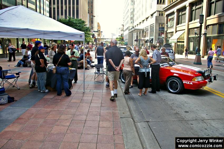 The Mark Utecht / Rob Bohn Ford Mustang and the Rally-America store tent on the Nicollet Mall (1).