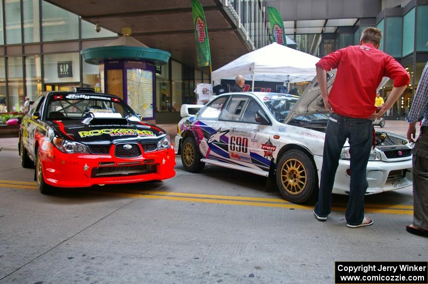The Andy Pinker / Robbie Durant Subaru WRX STi and Kenny Bartram / Dennis Hotson Subaru Impreza L Coupe on the Nicollet Mall.
