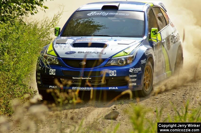 Travis Pastrana / Derek Ringer wring out their Subaru WRX STi on the practice stage.