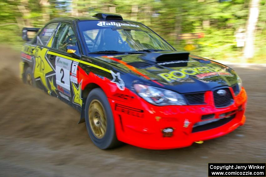 Andy Pinker / Robbie Durant drift beautifully through a right-hander on SS2 in their Subaru WRX STi.