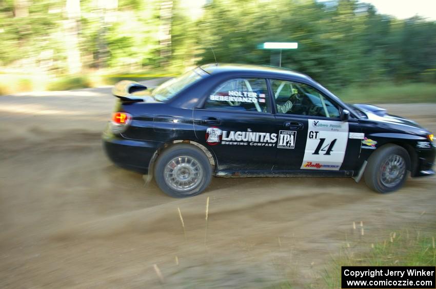 Amy BeberVanzo / Ole Holter drift their Subaru WRX nicely through a right-hander on SS2.