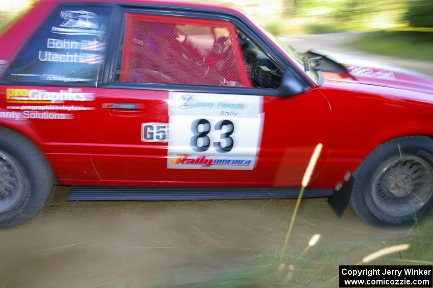 Mark Utecht / Rob Bohn drift their Ford Mustang through a 90-right on SS2.