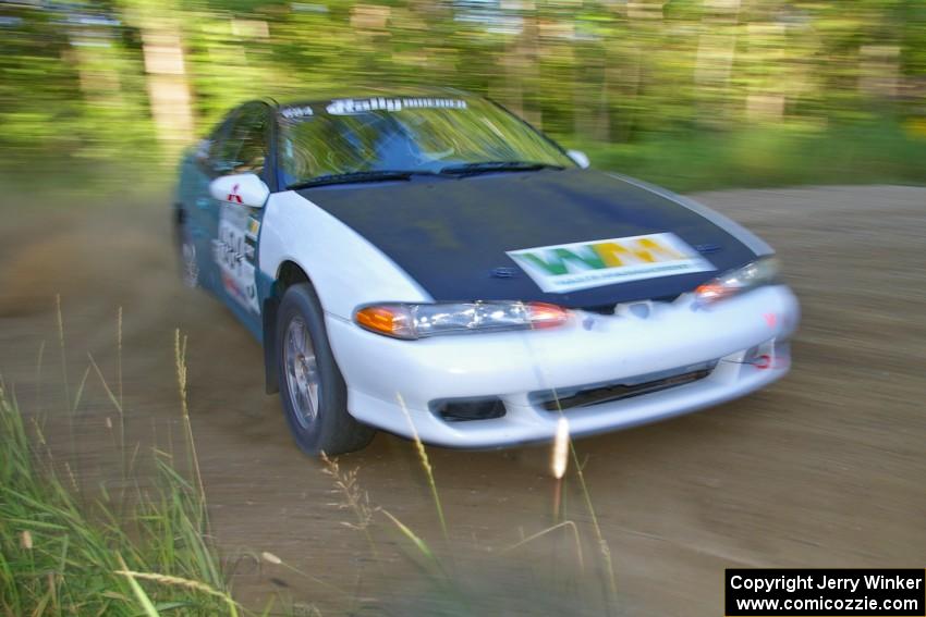 Adam Markut / Chris Gordon drift through a right-hander on SS2 in their Eagle Talon.