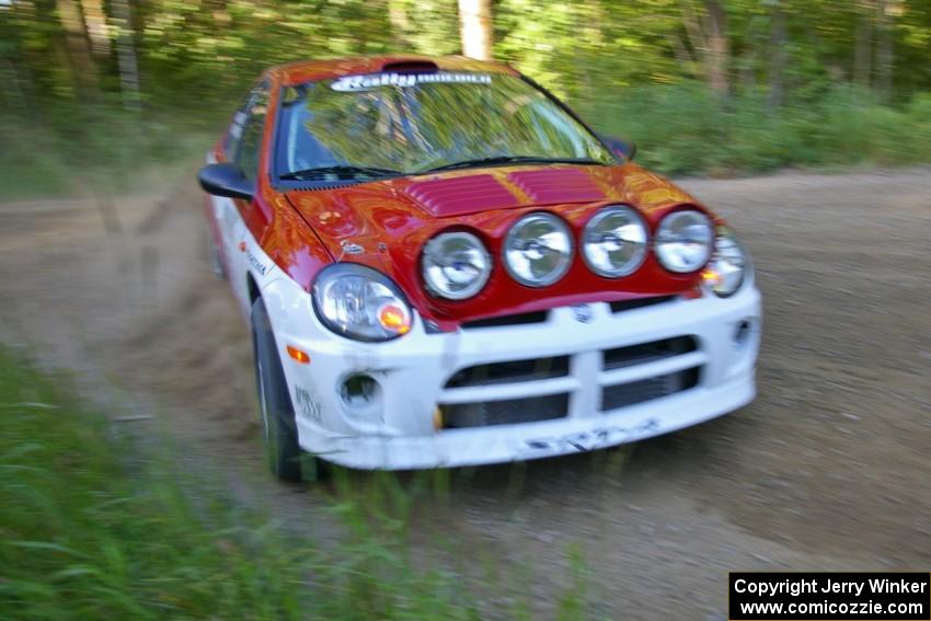 Doug Shepherd / Karen Wagner beautifully apex a right-hander on SS2 in their Dodge SRT-4.