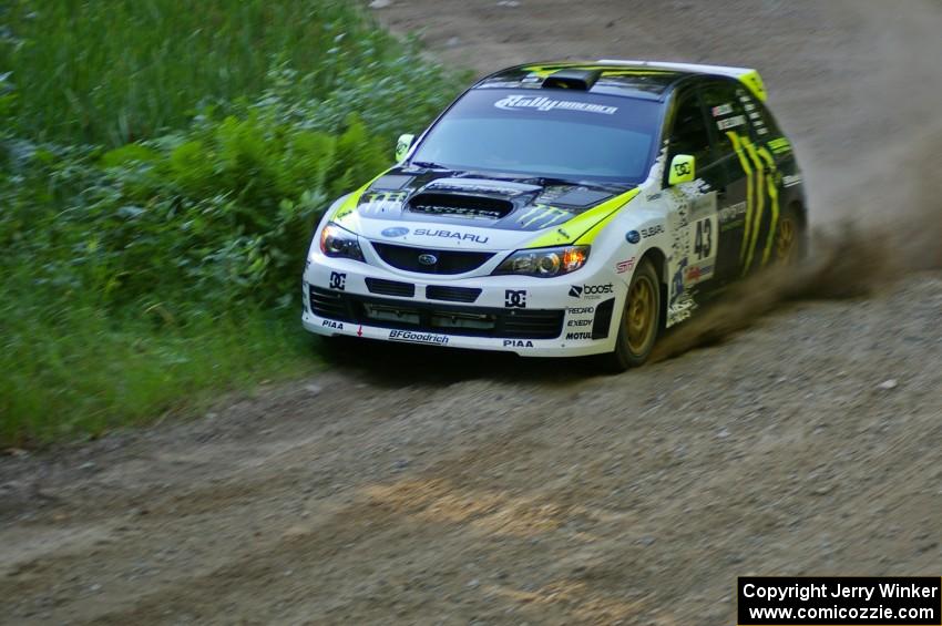 Ken Block / Alex Gelsomino get close to a swamp on the inside of a corner on SS3 in their Subaru WRX STi.