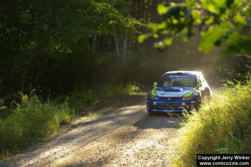 Travis Pastrana / Derek Ringer prepare for a hard right on SS3 in their Subaru WRX STi.