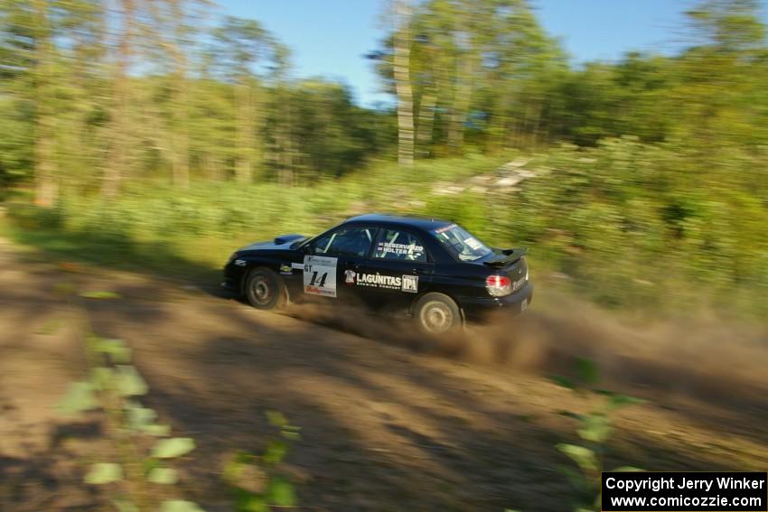 Amy BeberVanzo / Ole Holter set up their Subaru WRX for hard right-hander on SS3.