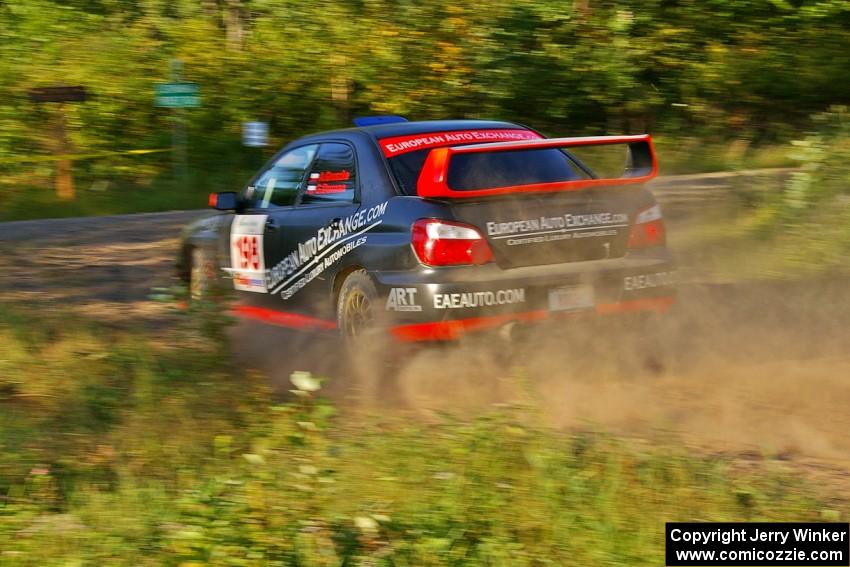 Arkadiusz Gruszka / Grzegorz Dorman prepare for a hard right on SS3 in their Subaru WRX STi.