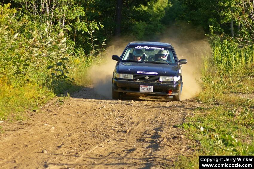 Ben Hanka / Greg Hanka rocket down a straight on SS3 in their Nissan Sentra SE-R.