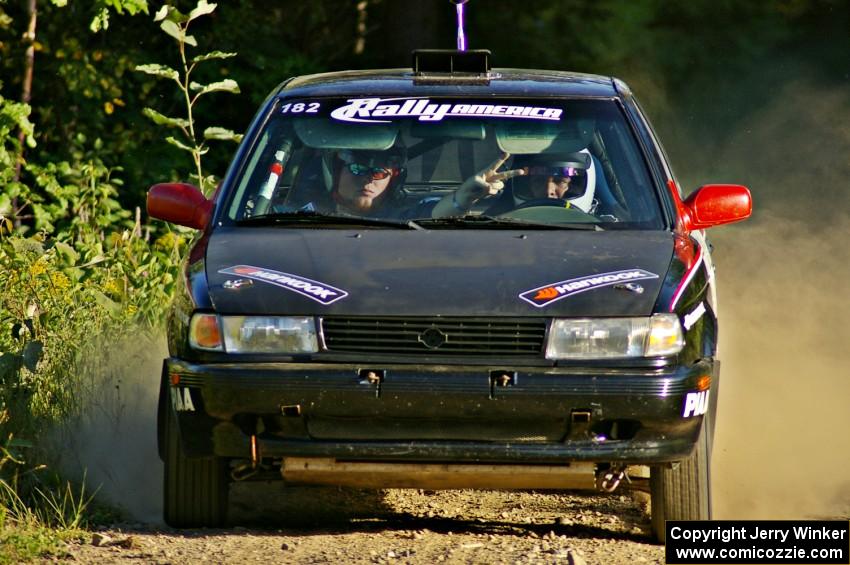 Silvio Alva / Ben Slocum prepare for a hard right on SS2 in their Nissan Sentra SE-R.