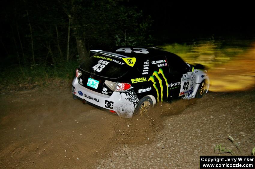 Ken Block / Alex Gelsomino at speed through a sweeper on SS5 in their Subaru WRX STi.