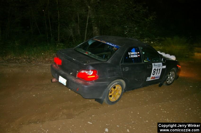 Jaroslaw Sozanski / Bartosz Sawicki fly through a sweeper on SS5 in their Subaru WRX.