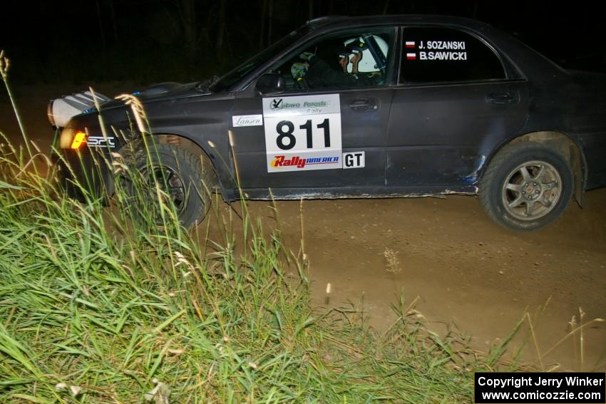 Jaroslaw Sozanski / Bartosz Sawicki drift through a corner on SS6 in their Subaru WRX.