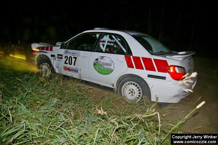 Dave Hintz / Rick Hintz exit out of a right-hander on SS6 in their Subaru WRX.