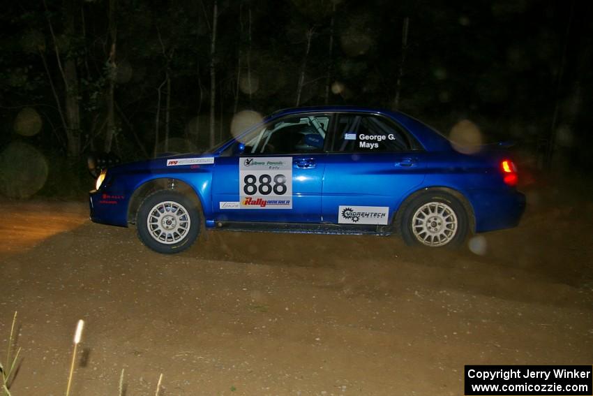 The George Georgakopoulos / Faruq Mays Subaru WRX goes wide through a left-hander on SS6.