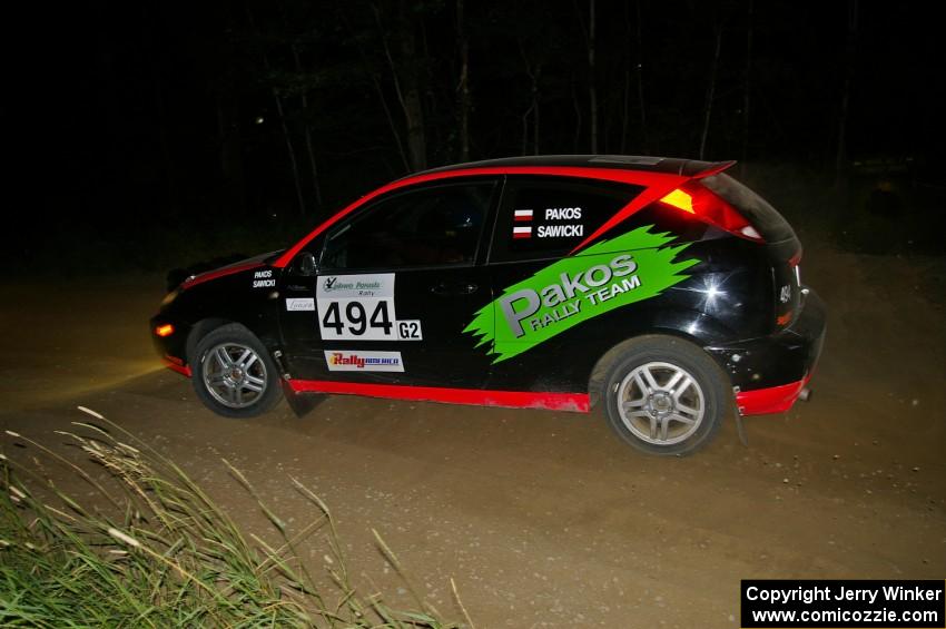 Roman Pakos / Maciej Sawicki exit a left-hander on SS6 in their Ford Focus SVT.